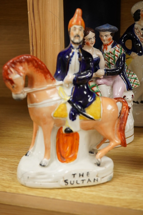 Eleven Staffordshire flatback figures to include The Sultan, largest 24cm high. Condition - some breaks